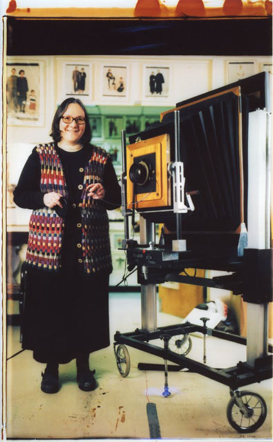 A self-portrait of Dorfman with her giant Polaroid camera, shot with another giant Polaroid camera. Photo by Elsa Dorfman and licensed under CC BY-SA 3.0. A self-portrait of Dorfman with her giant Polaroid camera, shot with another giant Polaroid camera. Photo by Elsa Dorfman and licensed under CC BY-SA 3.0.