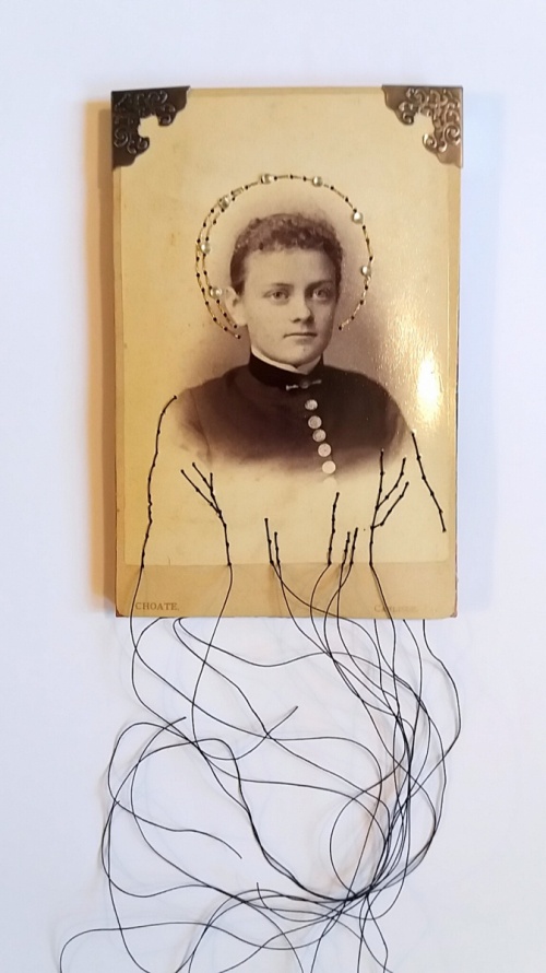 Maryann Riker - The Saint of Repressed Anticipation - Stitched cabinet card of young woman depicted as sainted icon with stitched halo of pearls