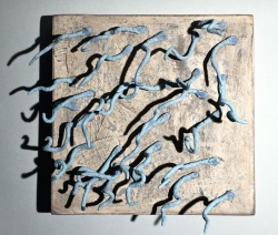 porcelain construction on wood panel